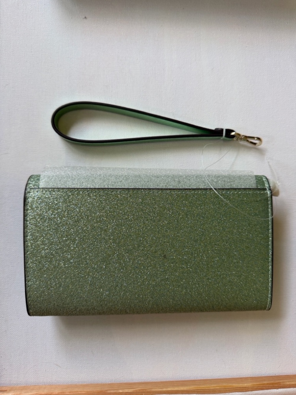 Kenzie boxed glitter medium flap phone wristlet in the color seawater - Picture 4 of 7
